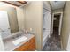 Clean bathroom with tub, shower, vanity, and granite countertop at 5225 Imperial Lakes Blvd # 22, Mulberry, FL 33860
