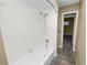 Simple bathroom with shower/tub combo and tiled walls at 5225 Imperial Lakes Blvd # 22, Mulberry, FL 33860