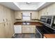 Kitchen with stainless steel appliances and wood cabinets at 5225 Imperial Lakes Blvd # 22, Mulberry, FL 33860