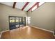 Living room showcasing sliding doors to a screened lanai at 5225 Imperial Lakes Blvd # 22, Mulberry, FL 33860