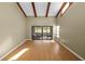 Living room with sliding doors leading to a screened porch at 5225 Imperial Lakes Blvd # 22, Mulberry, FL 33860