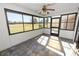 Sunroom with tile flooring and view of backyard at 5225 Imperial Lakes Blvd # 22, Mulberry, FL 33860