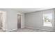 Bedroom with a walk-in closet and window offering natural light at 572 Sw 77Th Cir, Ocala, FL 34480
