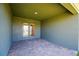 Outdoor patio with stone floors and access to a pair of glass patio doors at 5126 Villa Crest Way, Auburndale, FL 33823