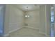 Elegant dining room featuring decorative wall trim, a modern chandelier, and tile flooring at 5126 Villa Crest Way, Auburndale, FL 33823