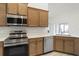 Modern kitchen featuring stainless steel appliances and beautiful countertops at 1365 Melrose St, Lake Alfred, FL 33850