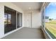 Screened patio with sliding glass doors and views of backyard at 1365 Melrose St, Lake Alfred, FL 33850