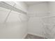 Walk-in closet with neutral carpet and wire shelving at 1365 Melrose St, Lake Alfred, FL 33850