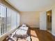 Bright bedroom featuring hard wood floors and large window at 1836 N Crystal Lake Dr # 46, Lakeland, FL 33801