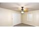 Bedroom with carpet, ceiling fan, and closet at 2556 Roslyn Ln, Lakeland, FL 33812