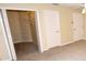 Large walk-in closet features shelving and plenty of storage space for your wardrobe at 2556 Roslyn Ln, Lakeland, FL 33812