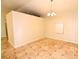 Tiled dining room with modern lighting and bright natural light at 2556 Roslyn Ln, Lakeland, FL 33812