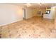 Bright living room with tile flooring and an open floor plan to the kitchen at 2556 Roslyn Ln, Lakeland, FL 33812