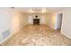 Bright living room featuring tile floors and a decorative mosaic fireplace for a cozy focal point at 2556 Roslyn Ln, Lakeland, FL 33812