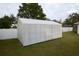 View of outdoor storage shed and fenced in yard at 2556 Roslyn Ln, Lakeland, FL 33812