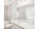 Neutral full bathroom with a shower-tub combo and vanity with great lighting at 3166 Laurel Oak Ln, Winter Haven, FL 33884