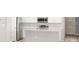Kitchen featuring stainless steel appliances, an island, and lots of storage at 3166 Laurel Oak Ln, Winter Haven, FL 33884
