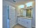 A bathroom with double sinks and granite countertops at 4712 Grandview Glen Dr, Auburndale, FL 33823
