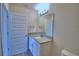 Bright bathroom with granite countertop and white vanity at 4712 Grandview Glen Dr, Auburndale, FL 33823