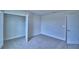 Bright bedroom with closet and neutral color carpet at 4712 Grandview Glen Dr, Auburndale, FL 33823