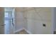 Convenient laundry room featuring wire shelving with washer and dryer hookups at 4712 Grandview Glen Dr, Auburndale, FL 33823