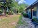 Private backyard offering ample green space and mature landscaping at 6718 Trail Ridge Dr, Lakeland, FL 33813
