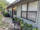 Well-maintained backyard with a walkway leading to the home at 6718 Trail Ridge Dr, Lakeland, FL 33813