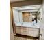 Bathroom features a double sink vanity and a skylight at 6718 Trail Ridge Dr, Lakeland, FL 33813