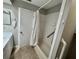 Accessible bathroom with a shower-tub combo and safety bars at 6718 Trail Ridge Dr, Lakeland, FL 33813