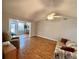 Bright living room with vaulted ceiling, fan and open layout at 6718 Trail Ridge Dr, Lakeland, FL 33813