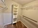 Organized walk-in closet with adjustable shelving for optimal storage at 6718 Trail Ridge Dr, Lakeland, FL 33813