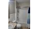 Bathroom showcases a tub/shower combo, toilet, and vanity with neutral countertops at 6799 Glenbrook Dr, Lakeland, FL 33811