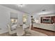 Elegant dining area featuring a round table with seating for six, open to the living area at 6799 Glenbrook Dr, Lakeland, FL 33811