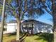 Attractive one-story home with a well-kept lawn and an attached two-car garage, ideal for comfort at 6799 Glenbrook Dr, Lakeland, FL 33811