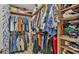 Well-organized walk-in closet with ample shelving and hanging space for storage at 6799 Glenbrook Dr, Lakeland, FL 33811