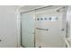 Walk-in shower with grab bars and updated tile at 718 Barber Cir # 718, Lakeland, FL 33803