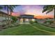 Spacious backyard with grassy lawn, providing ample outdoor space at 2325 Bella Luna Cir, Lakeland, FL 33810