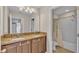Bathroom boasts double sinks, granite countertops, and a shower/tub combo at 2325 Bella Luna Cir, Lakeland, FL 33810