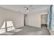 Well-lit bedroom with window, ceiling fan, and walk-in closet at 2325 Bella Luna Cir, Lakeland, FL 33810