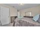 Cozy bedroom featuring a dresser and soft grey blanket at 2325 Bella Luna Cir, Lakeland, FL 33810