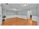 Spacious bonus room with hardwood floors and access to bathroom at 2325 Bella Luna Cir, Lakeland, FL 33810