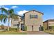 Two-story home with attractive facade, two-car garage, and landscaping at 2325 Bella Luna Cir, Lakeland, FL 33810