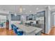 Modern kitchen featuring a large island and stainless steel appliances at 2325 Bella Luna Cir, Lakeland, FL 33810