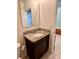 Bathroom featuring granite countertop, vanity, mirror, and toilet with a tiled floor at 3136 Country Club Cir, Winter Haven, FL 33881