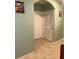 Light and bright hallway with access to laundry and other rooms at 3136 Country Club Cir, Winter Haven, FL 33881