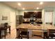 Island kitchen with granite countertops and stainless steel appliances at 3136 Country Club Cir, Winter Haven, FL 33881