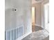 A hallway entrance leads to a bedroom with neutral paint and tile flooring at 4050 Tullamore Ln, Auburndale, FL 33823