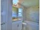 Bathroom with granite countertop, tub, tiled shower and brushed nickel fixtures and lighting at 4639 Grandview Glen Dr, Auburndale, FL 33823