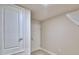 Walk-in closet with shelving and ample storage space, featuring neutral-toned walls and trim at 4639 Grandview Glen Dr, Auburndale, FL 33823