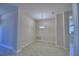 Elegant dining room featuring decorative wall paneling and a modern chandelier at 4639 Grandview Glen Dr, Auburndale, FL 33823
